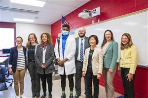 Mussa with teachers and Clinic reps